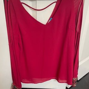 Burgundy silk top with rhinestone cuff detail